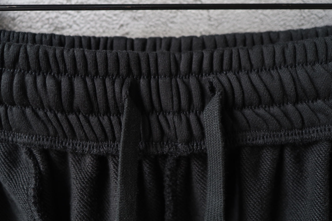 Balenciaga elastic waistband on black pants with gathered knit trim