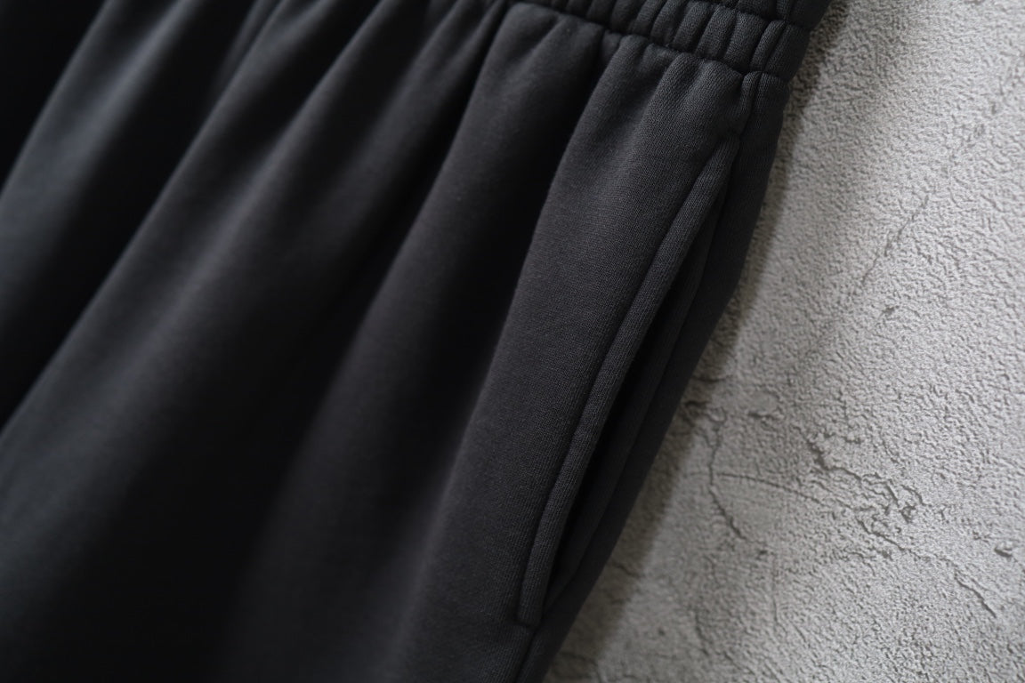 Balenciaga black shorts with smooth fabric and stitched panel seams