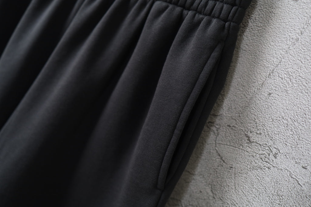 Balenciaga black pants with pleated front and tapered hem