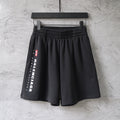 Balenciaga black shorts with wide elastic waistband and side logo print