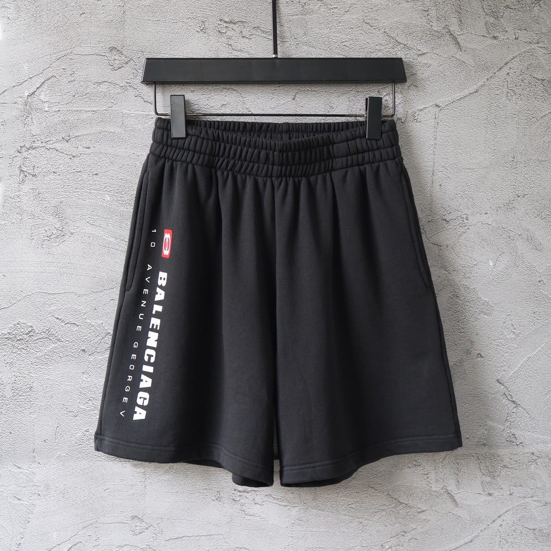 Balenciaga elastic-waist pants with side logo print, black