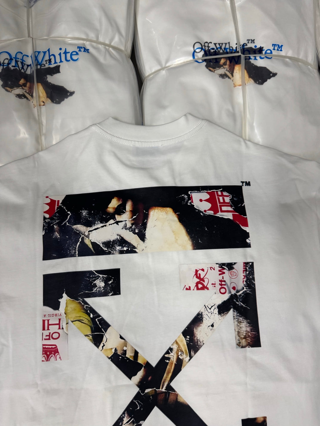 Off White T-shirt, white crewneck with bold X artwork and red accents