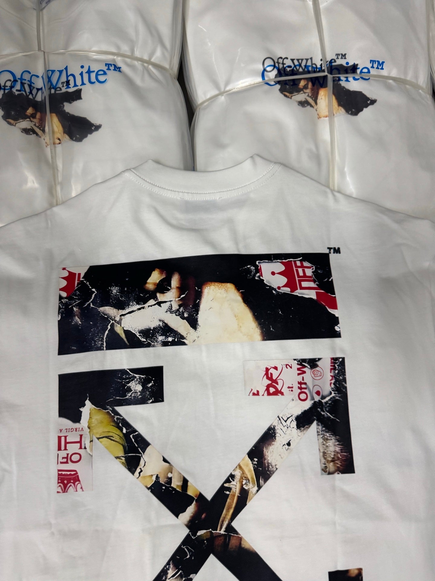 Off White T-shirt, white crewneck with bold X artwork and red accents