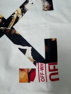 Off White T-shirt detail, white fabric with OFF-WHITE text and dark graphic shapes