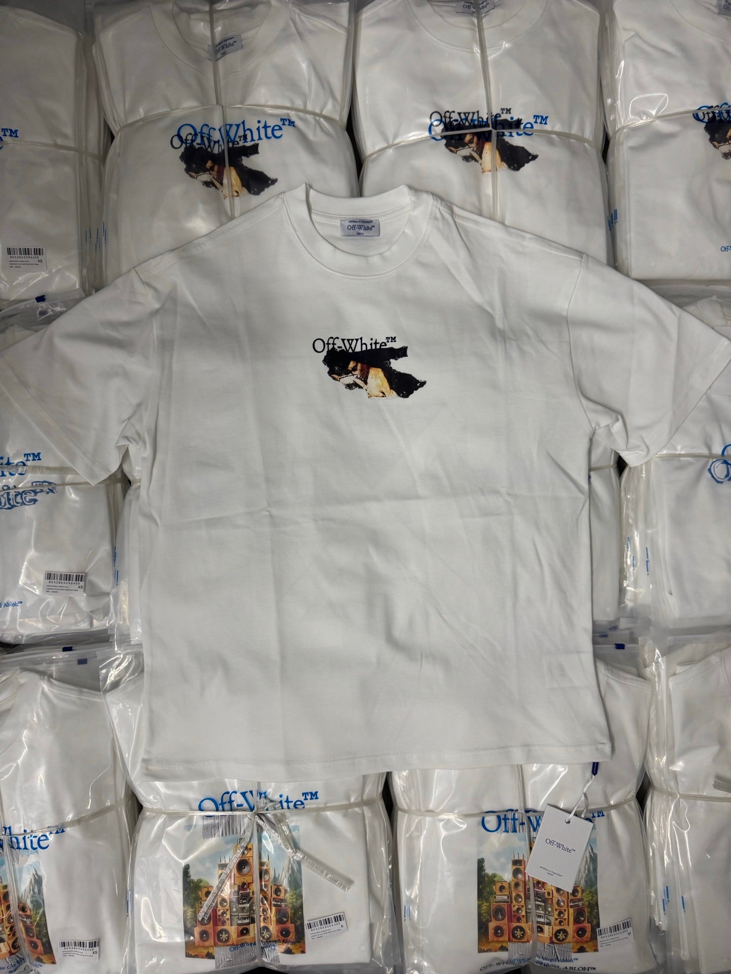 Off White T-shirt, white crewneck with small chest graphic and brand logo