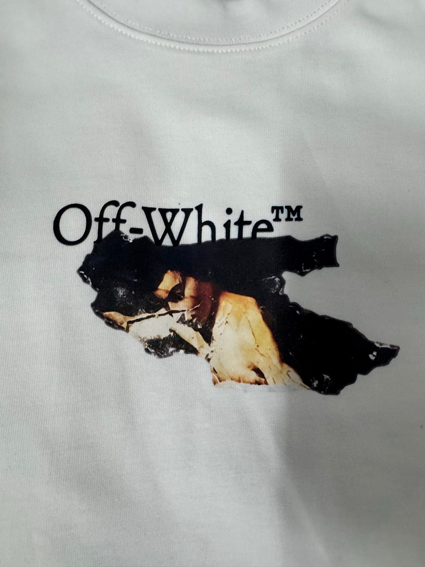 Off White T-shirt close-up, white crewneck with Off White logo graphic