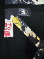 Black T-shirt close-up of back graphic artwork and red Off-White text