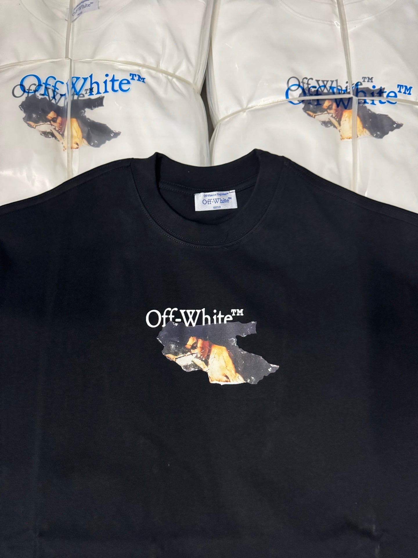 Off-White T-shirt, dark black, chest logo graphic centered on the front