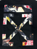 Black T-shirt close-up of oversized back graphic with collage artwork