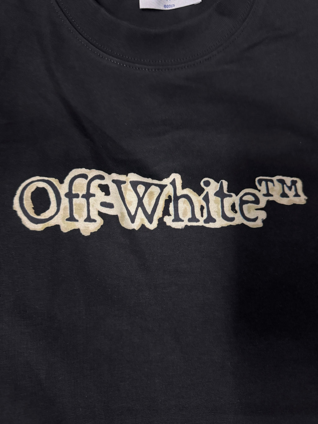 Black T-shirt featuring the Off-White logo in white lettering