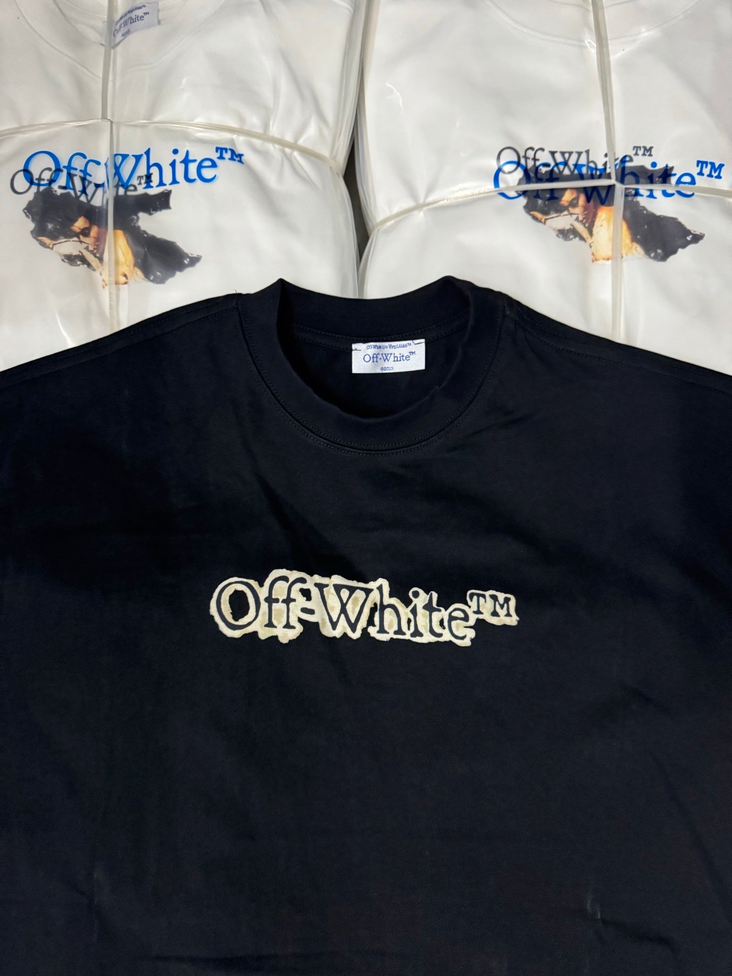 Black T-shirt with Off-White logo print on the chest