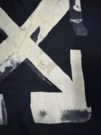 Black T-shirt close view: oversized off-white Off-White X graphic