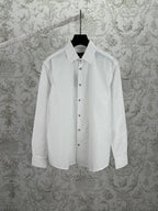 Louis Vuitton white long-sleeve button-up shirt with pointed collar and button placket