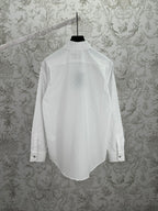 Louis Vuitton white long-sleeve button-up shirt, back view with yoke and button tabs