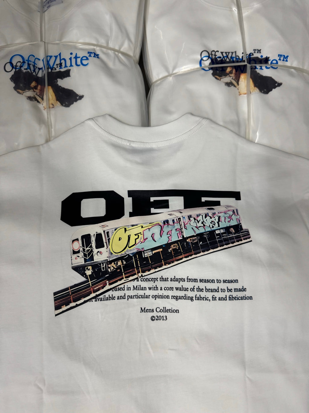 Off-White off-white T-shirt with large “OFF-WHITE” graphic and small descriptive text