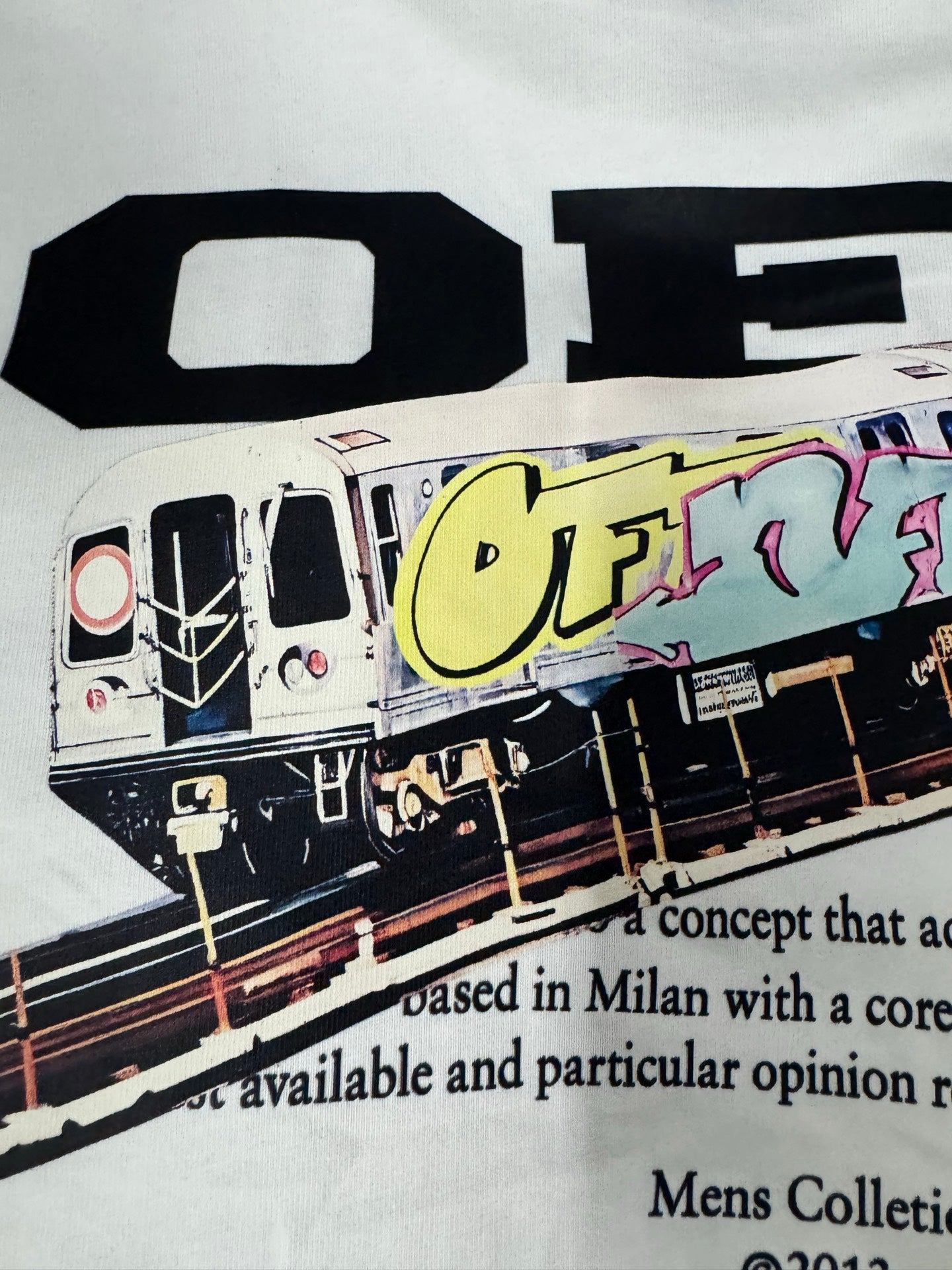 Off-White off-white T-shirt with oversized “OFF” lettering and colorful train graphic