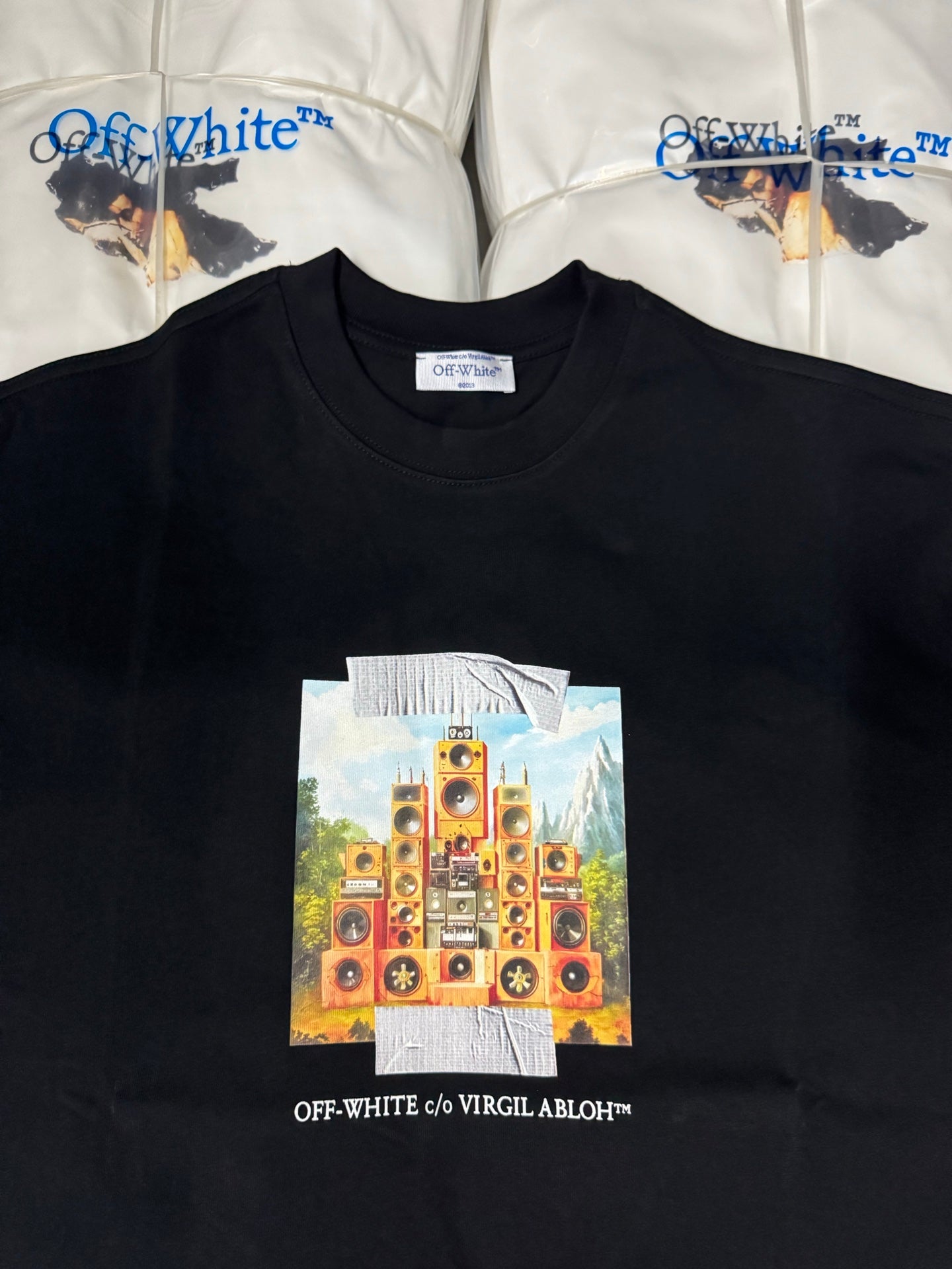 Off-White dark graphic T-shirt featuring central speaker tower artwork