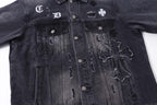 Dark denim jacket front with flap pockets and embroidered cross graphics