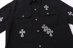 Black overshirt with snap buttons, flap pockets, and rhinestone cross motifs