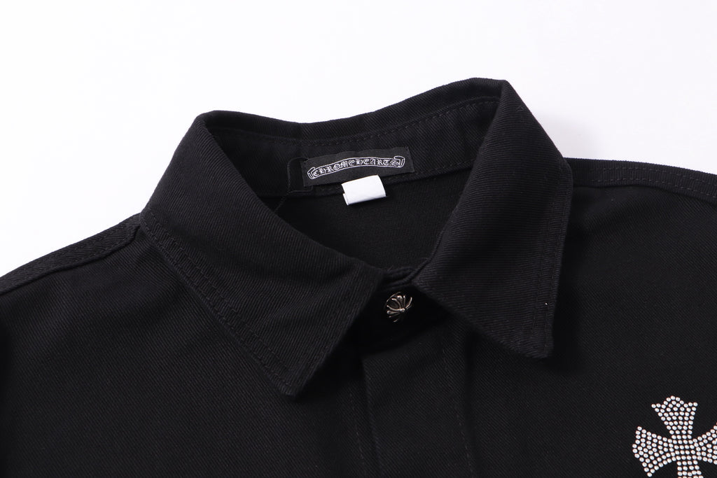 Black shirt jacket with pointed collar, button placket, and rhinestone logo detail