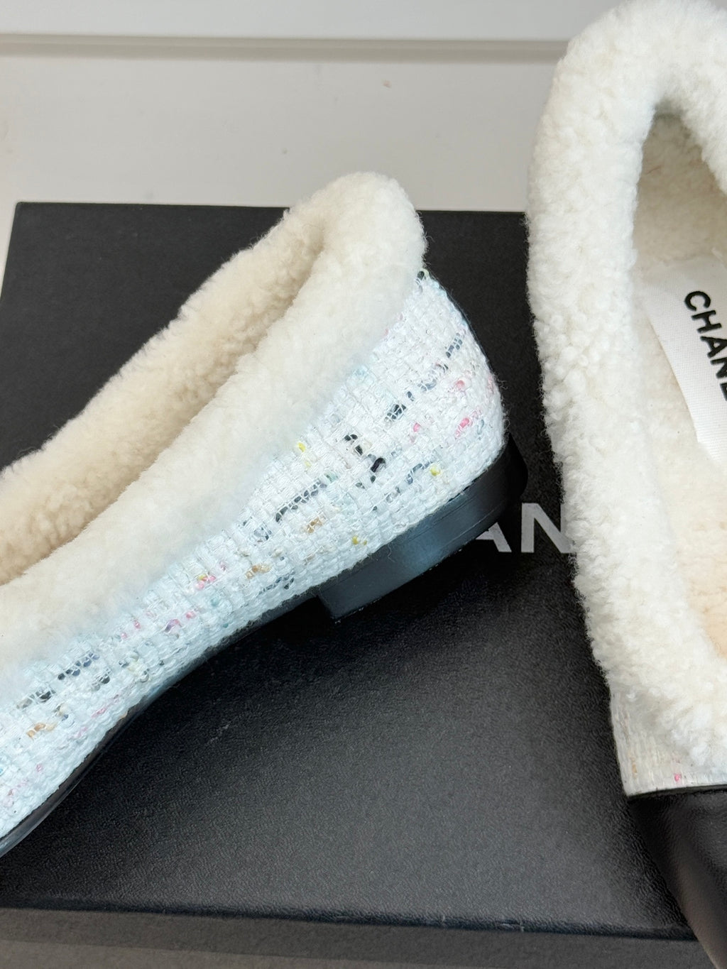 Women's Chanel shearling flat with light blue speckled strap and white fleece lining
