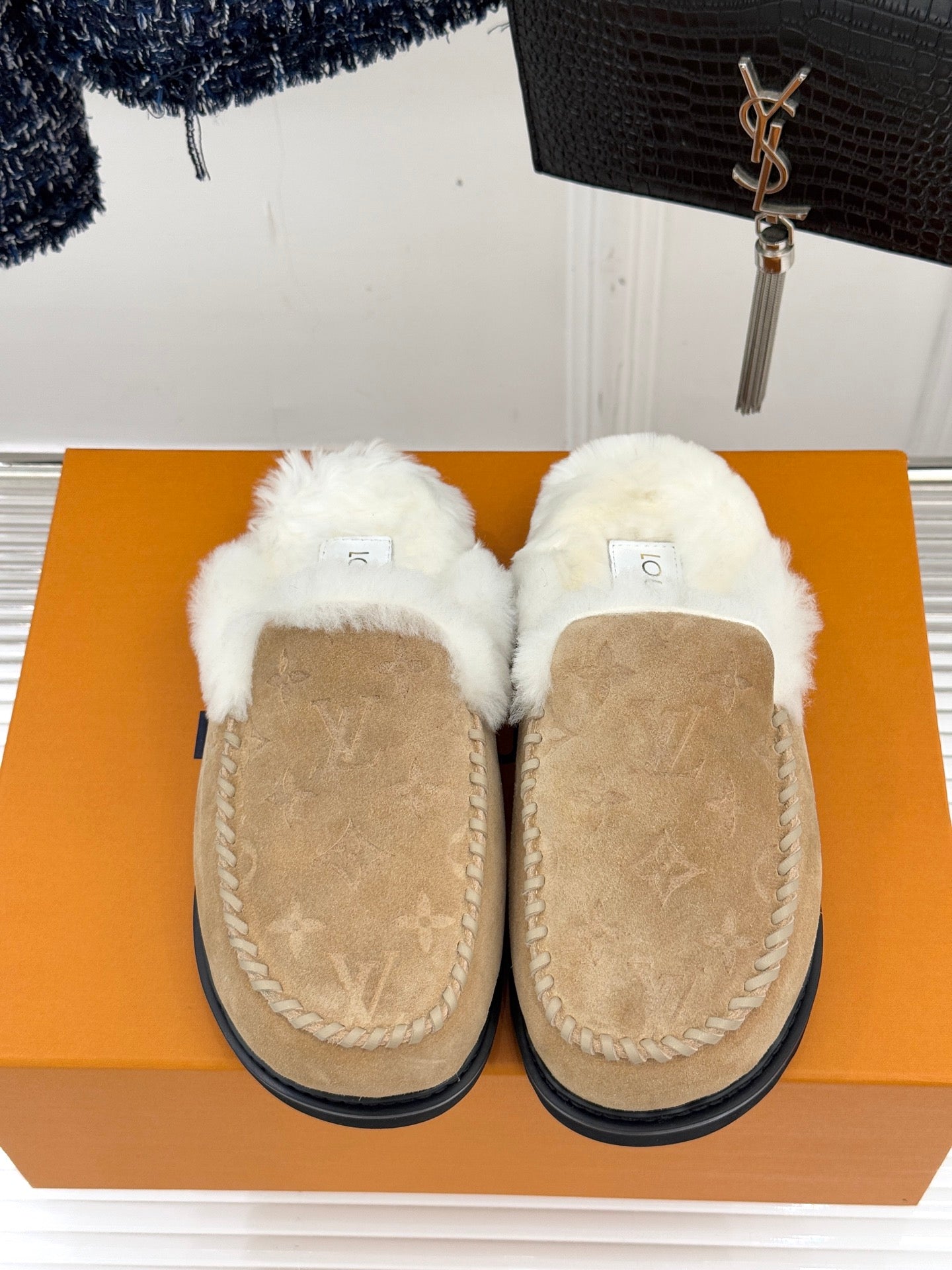 Louis Vuitton ladies shearling loafers, tan suede with white faux-fur topline and stitching