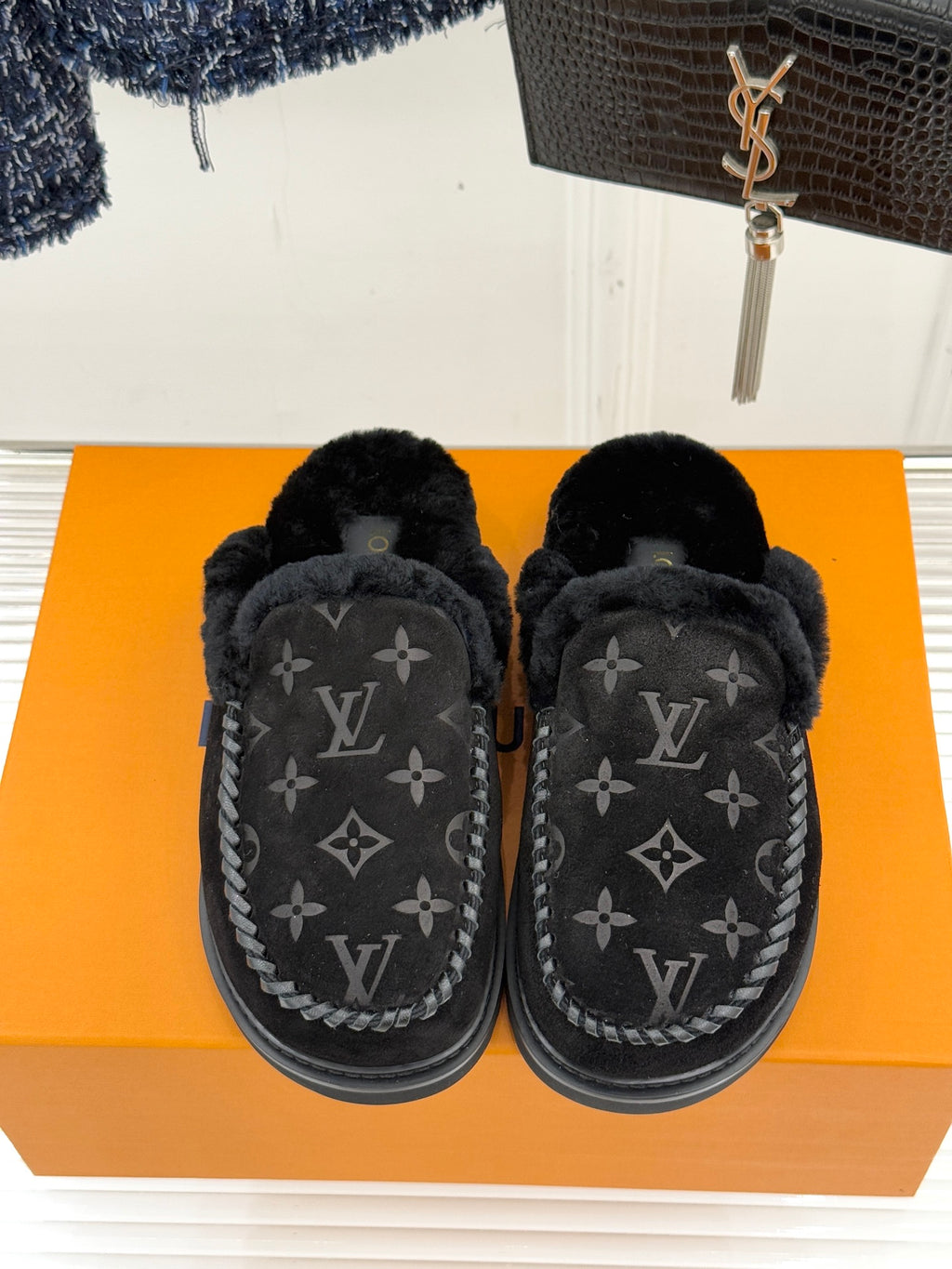 Louis Vuitton black monogram shearling loafers, front view