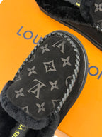 Louis Vuitton black monogram loafer with stitched lace trim and shearling
