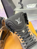 Louis Vuitton ladies high-top sneakers close-up of black padded tongue with LV logo