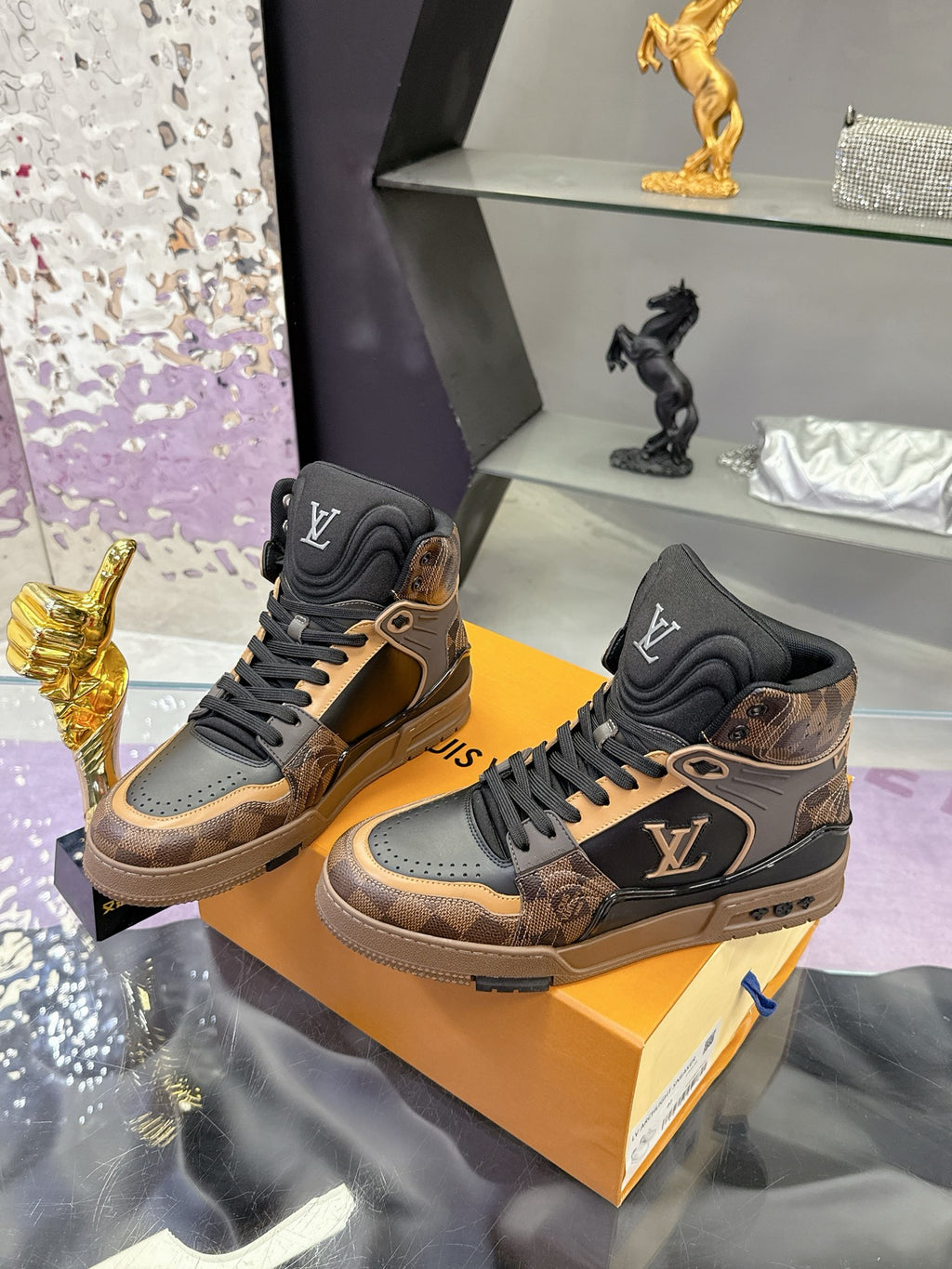 Louis Vuitton ladies high-top sneakers with black uppers and tan patterned panels