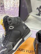 Louis Vuitton high-top sneaker, dark patterned canvas with black leather and side LV logo