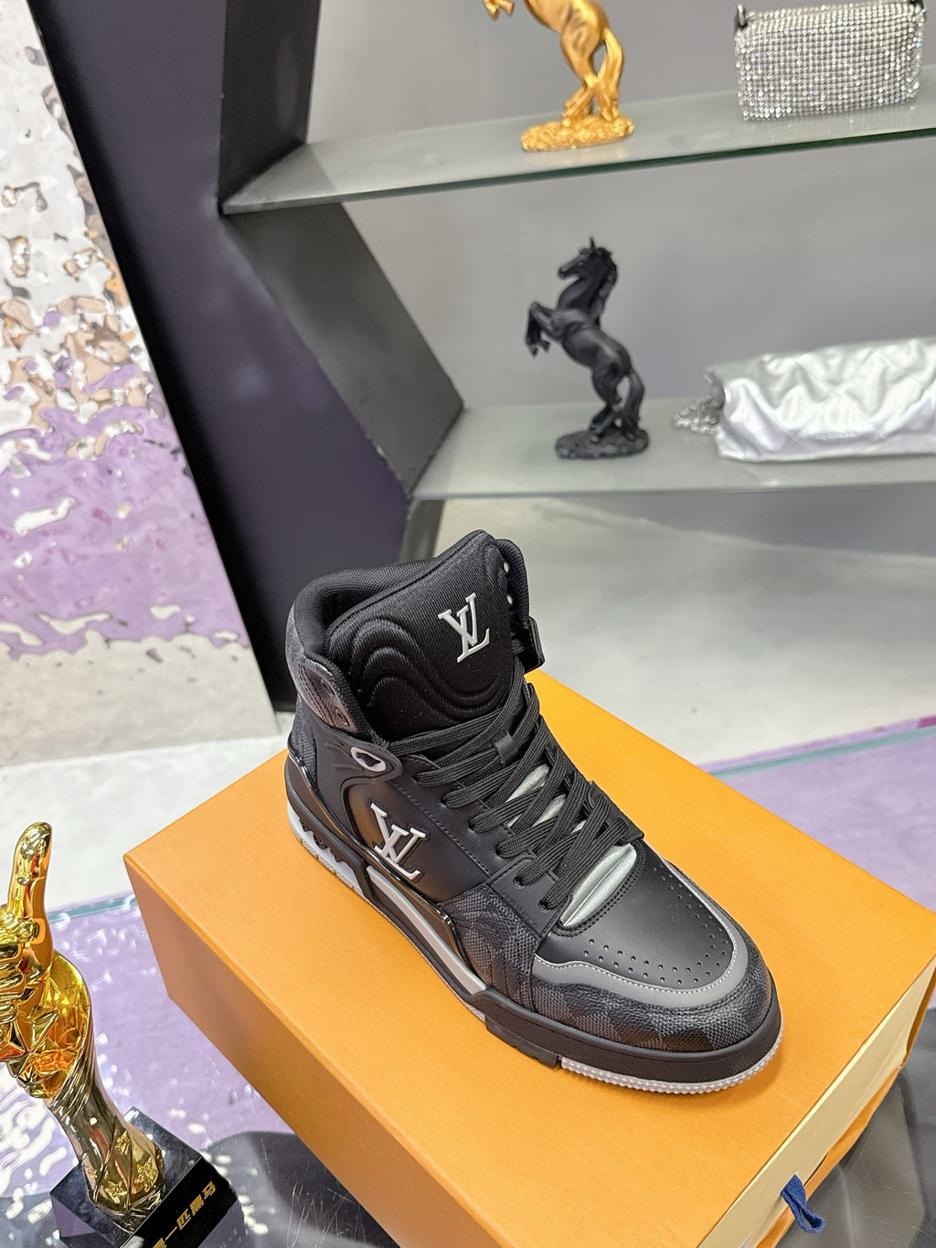 Louis Vuitton high-top sneaker, black with light gray toe panel and lace-up closure