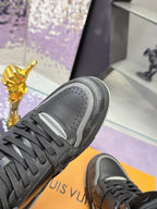 Louis Vuitton sneaker close-up, dark gray/black leather with lace-up and padded collar
