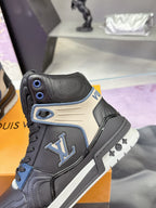 Louis Vuitton high-top sneaker with LV logo patch, black leather and blue eyelets
