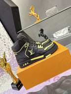 Black high-top sneakers with neon yellow piping, lace-up, and logo patch