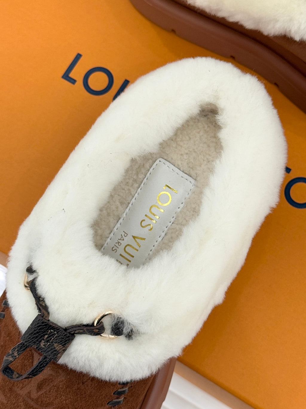 Louis Vuitton women's brown suede slippers with white shearling and insole label
