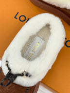 Louis Vuitton women's brown suede slippers with white shearling and insole label