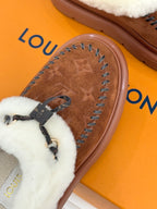 Louis Vuitton women's brown suede slippers with white shearling top and monogram stitching