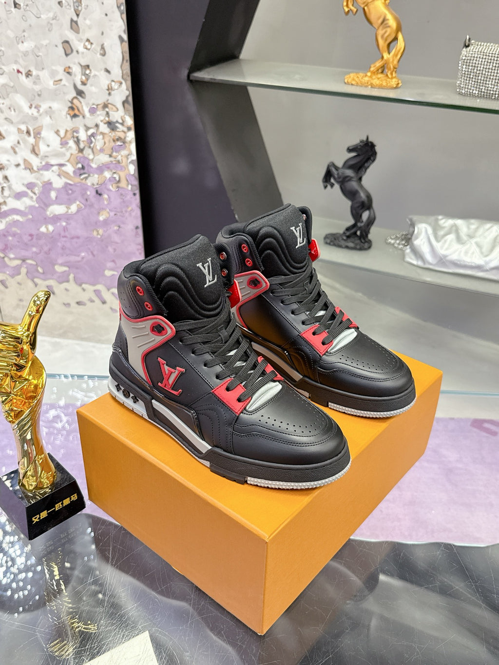 Louis Vuitton high-top sneakers, black with red piping and gray midsoles