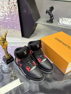 Louis Vuitton high-top sneakers pair, black with red laces and accent trim
