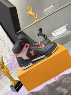 Louis Vuitton high-top sneakers on box, black with white panel and red accents
