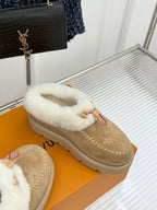 Ladies Louis Vuitton tan suede shearling slip-on shoe with white fur band