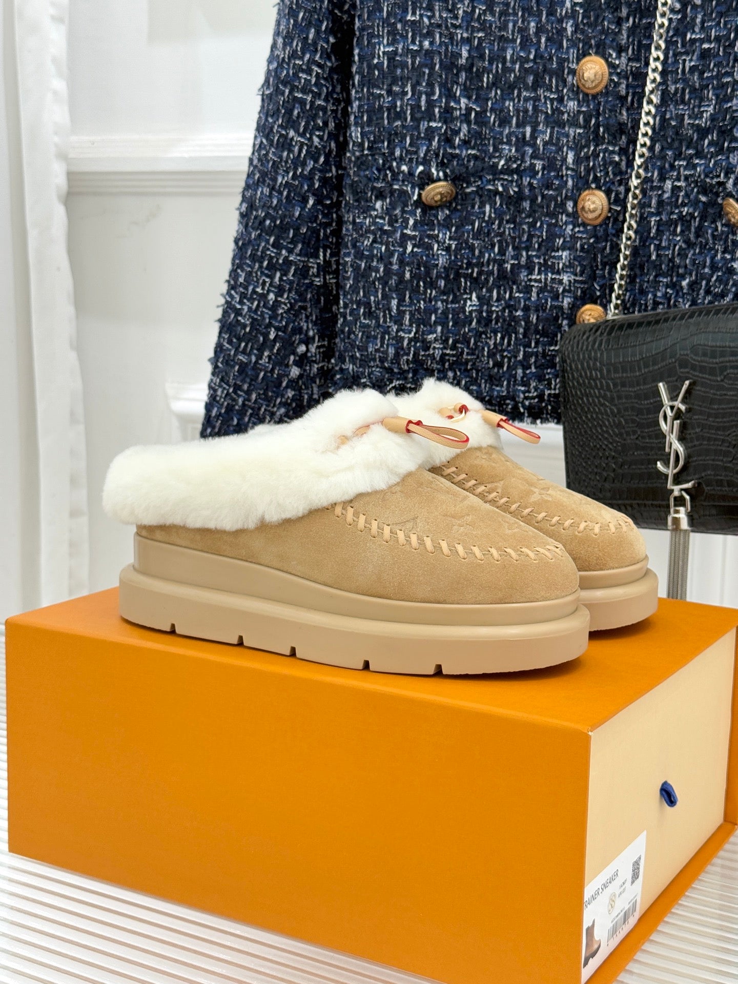 Ladies Louis Vuitton tan suede shearling slip-on shoes with cream fur trim