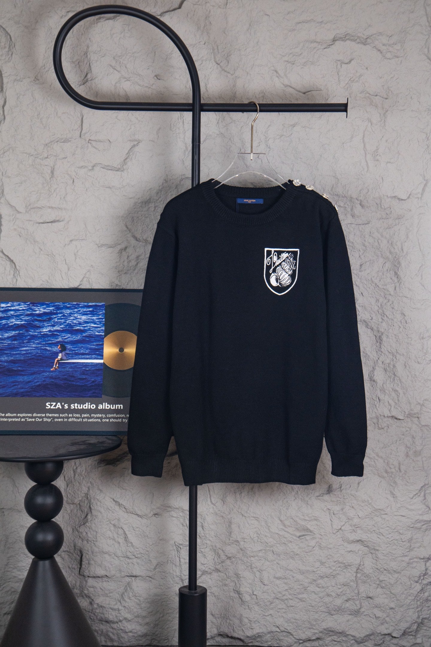 Louis Vuitton black crewneck long-sleeve sweater with crest graphic on chest