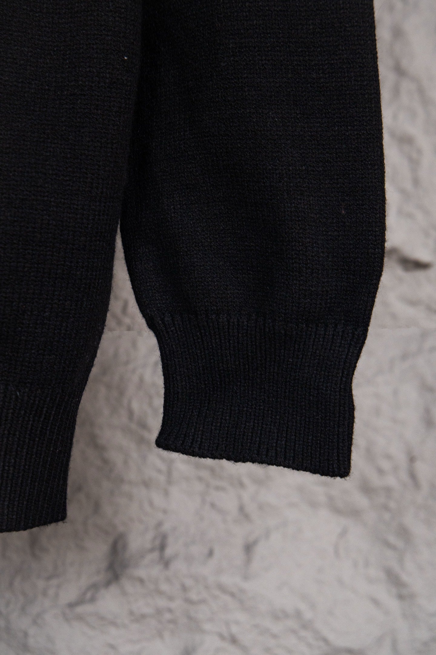 Louis Vuitton black sweater sleeve and ribbed cuff detail