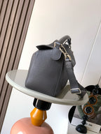 Loewe shoulder bag in dark blue-gray leather with top handle and adjustable strap