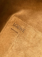 Loewe logo stamp on tan suede lining inside the bag, with embossed text detail