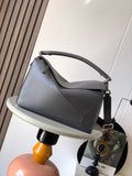 Loewe shoulder bag in dark blue-gray leather, top zip and curved strap