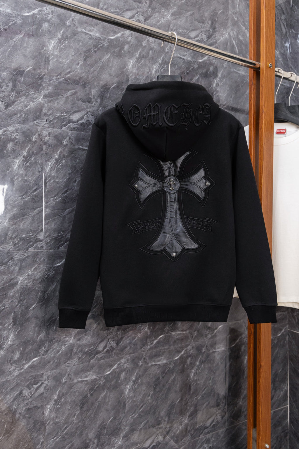 Black long zip hoodie, back view with large cross emblem graphic