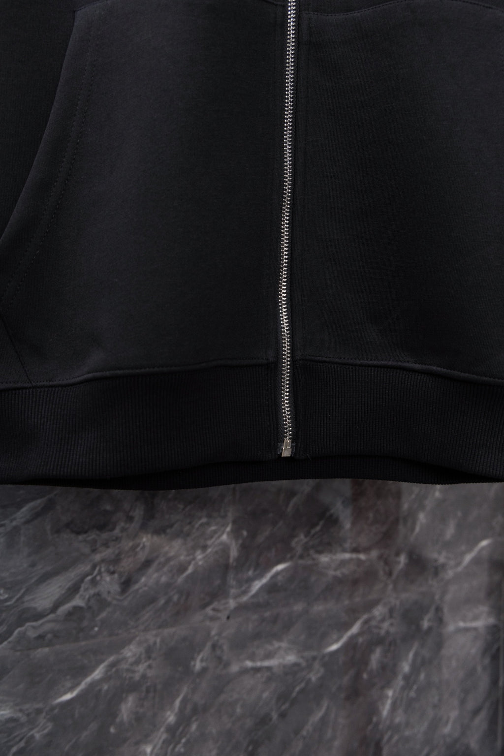 Chrome long black zip-up hoodie, full zipper and ribbed hem detail